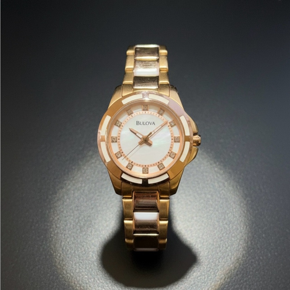 Bulova Women's rose Gold-Tone and White Watch